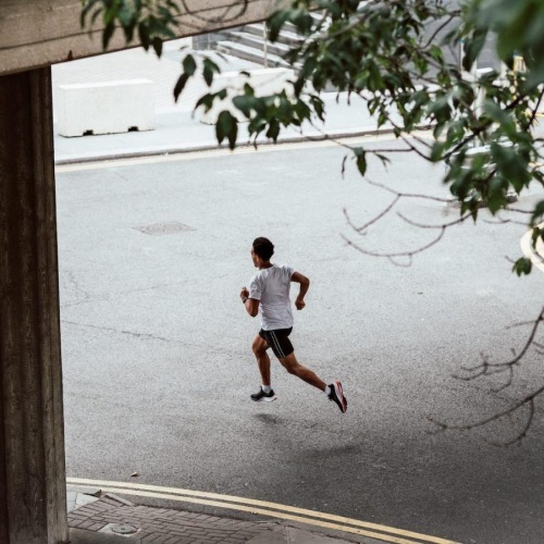 a man running on a street
